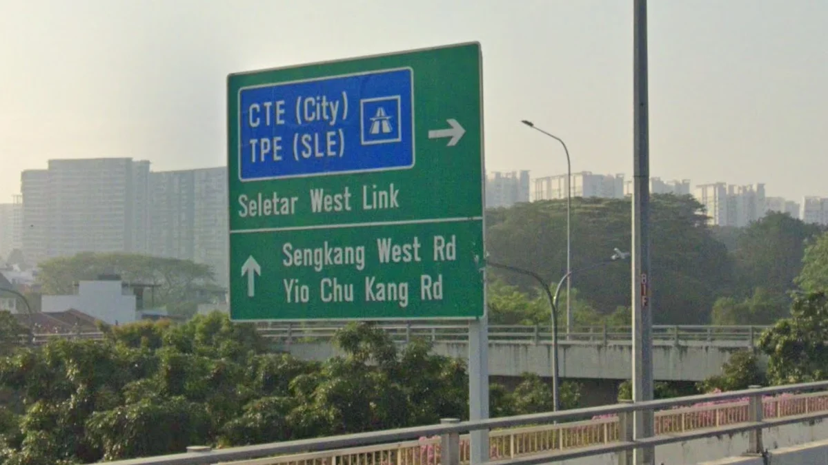 綠色英文方向指示牌